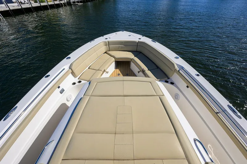 Slide: The Image of 2018 Pursuit S 408 Sport boat with spacious seating on calm water. - 34