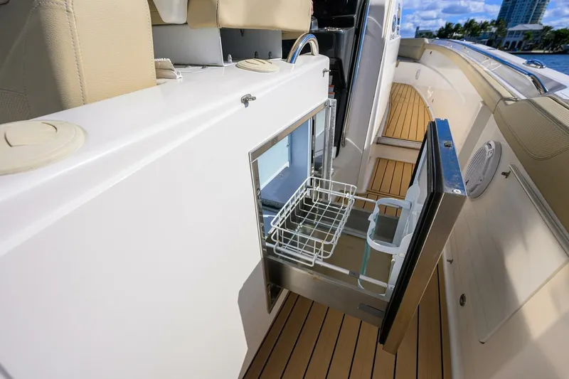 Slide: The Image of 2018 Pursuit S 408 Sport yacht with open drawer and teak flooring. - 9