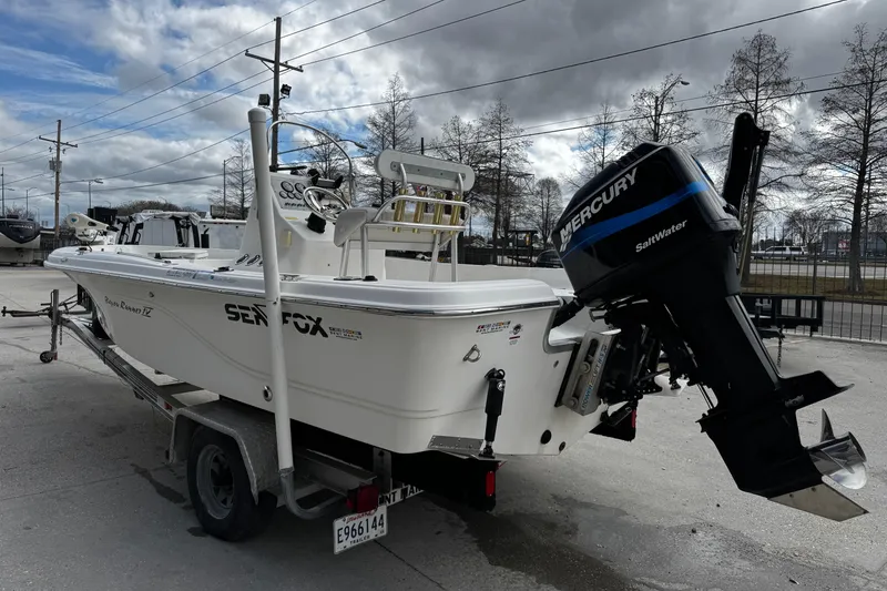 Slide: The Image of 2005 Sea Fox 205 Bay Fisher boat with Mercury outboard engine on trailer. - 15