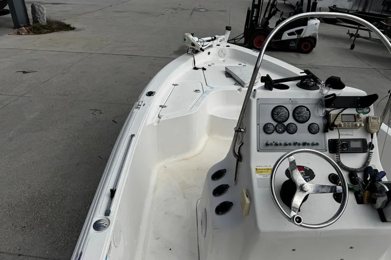 Slide: The Image of 2005 Sea Fox 205 Bay Fisher boat interior with steering console and controls. - 4