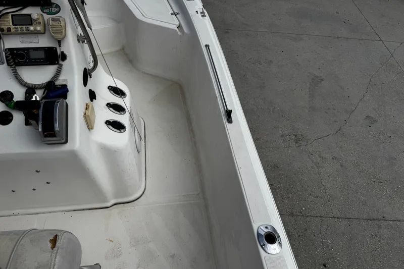 Slide: The Image of 2005 Sea Fox 205 Bay Fisher boat interior with control panel and seating. - 6