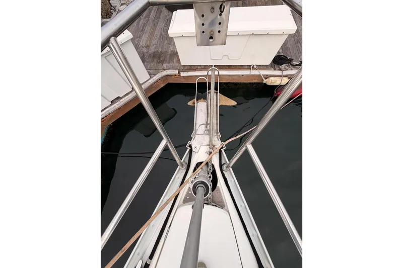 Slide: The Image of Bow view of 1997 Beneteau Oceanis 351 sailboat docked at marina. - 13