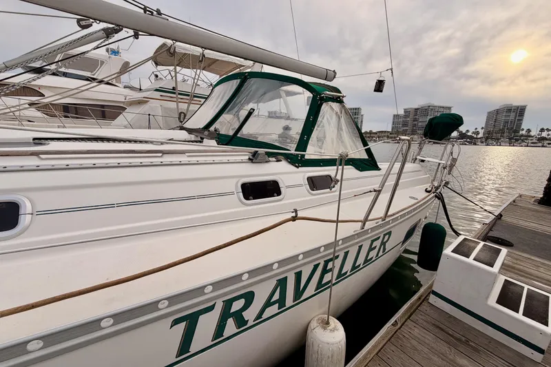Slide: The Image of 1997 Beneteau Oceanis 351 sailboat docked at marina during sunset. - 5