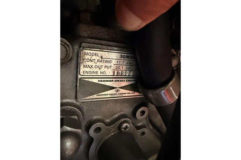 Slide: The Image of Yanmar diesel engine label on 1997 Beneteau Oceanis 351, showing model and power ratings. - 69