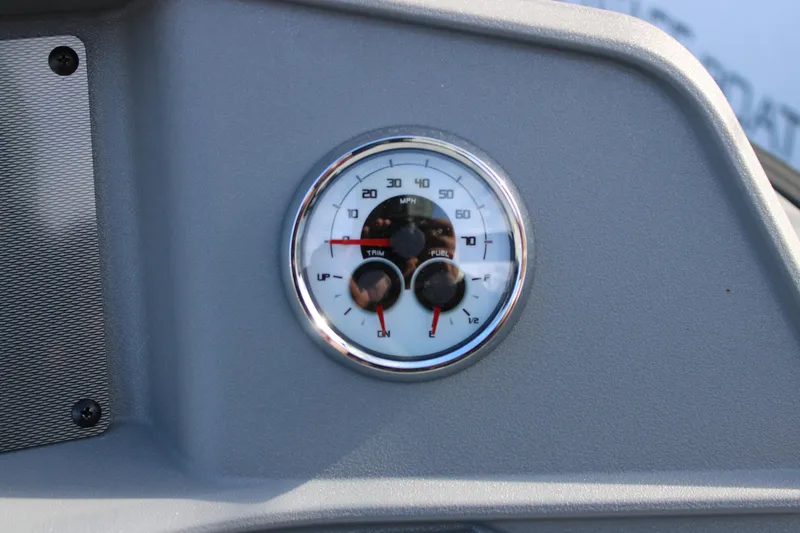 Slide: The Image of Dashboard gauge of 2026 Starcraft VX 22 R DH boat, showing speed and fuel levels. - 10