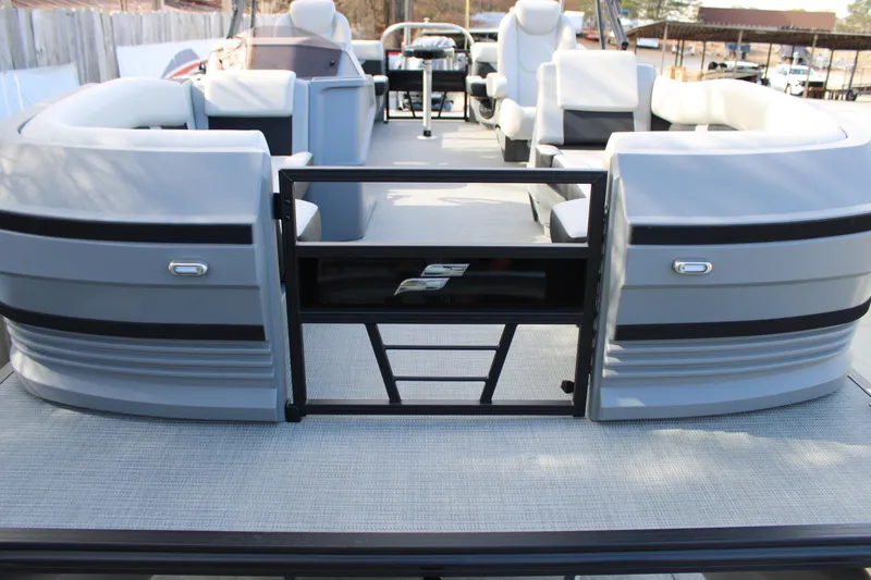 Slide: The Image of 2026 Starcraft VX 22 R DH pontoon boat interior with modern seating and sleek design. - 21