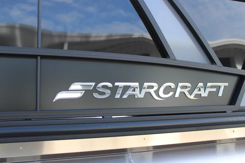 Slide: The Image of 2026 Starcraft VX 22 R DH logo on sleek metallic surface. - 22
