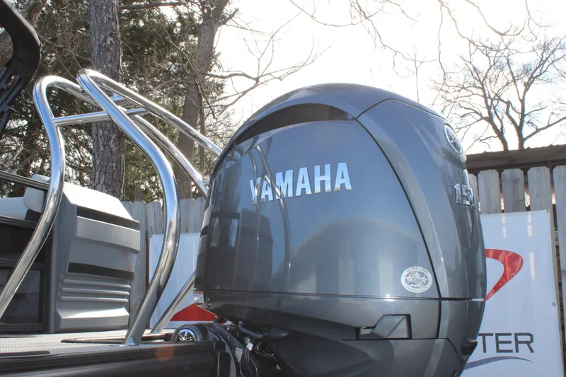 Slide: The Image of Yamaha outboard motor on 2026 Starcraft VX 22 R DH boat, outdoor setting. - 4