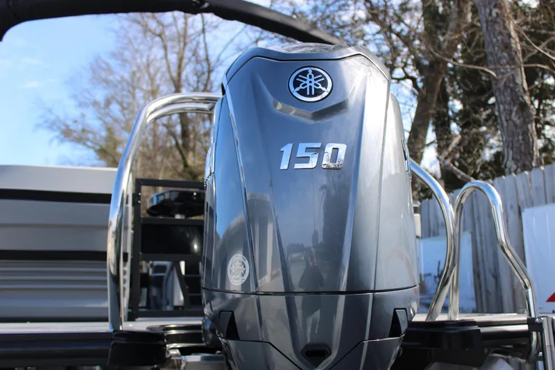 Slide: The Image of 2026 Starcraft VX 22 R DH with Yamaha 150 outboard motor, outdoors. - 5