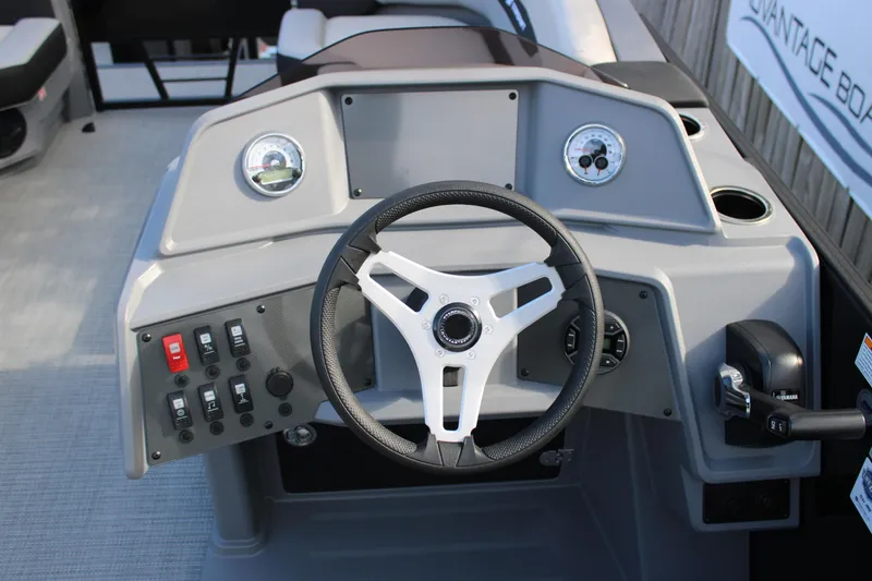 Slide: The Image of Steering console of 2026 Starcraft VX 22 R DH boat with gauges and controls. - 9
