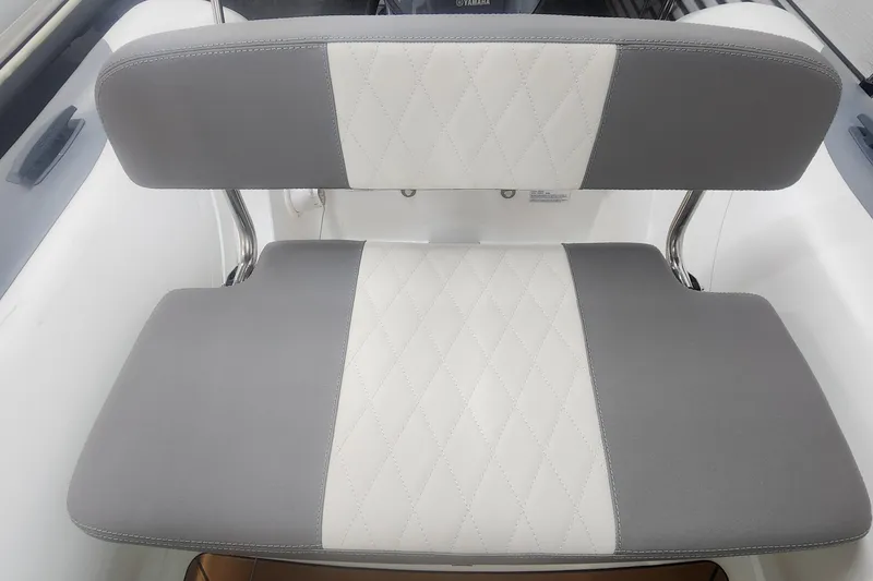 Slide: The Image of 2024 Gala A360L boat interior with steering wheel, cushioned seats, and wood accents. - 3