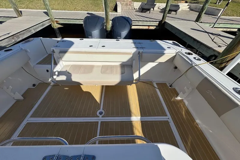 Slide: The Image of Bow of 2014 Stamas 317 Tarpon boat with anchor chain and cleats. - 21