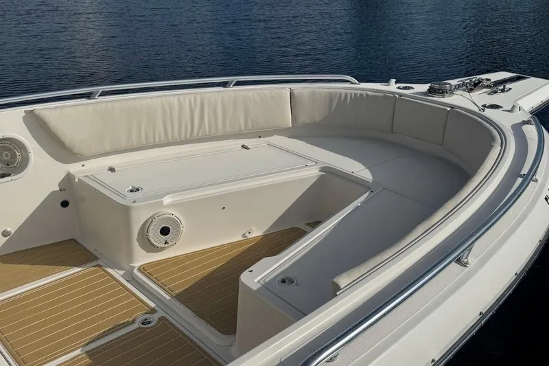 Slide: The Image of Open storage compartment on 2014 Stamas 317 Tarpon boat with rope inside. - 27