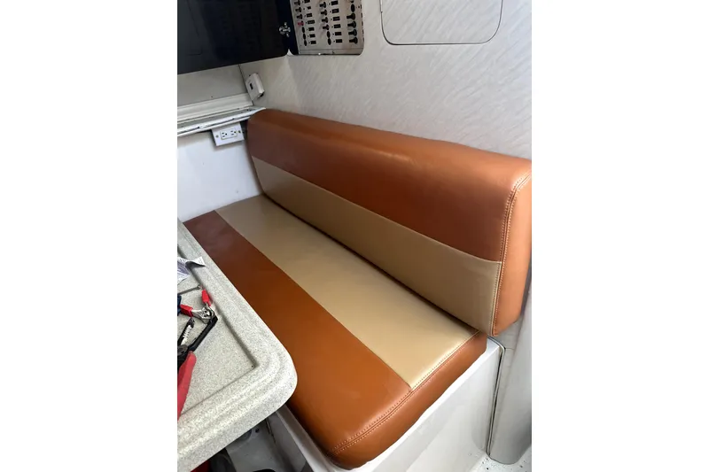 Slide: The Image of 1996 Wellcraft 330 Coastal boat on calm water. - 7