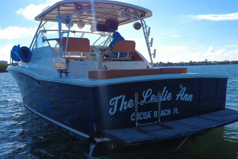 Slide: The Image of 1996 Wellcraft 330 Coastal boat named "The Leslie Ann" in Cocoa Beach, Florida waters. - 9