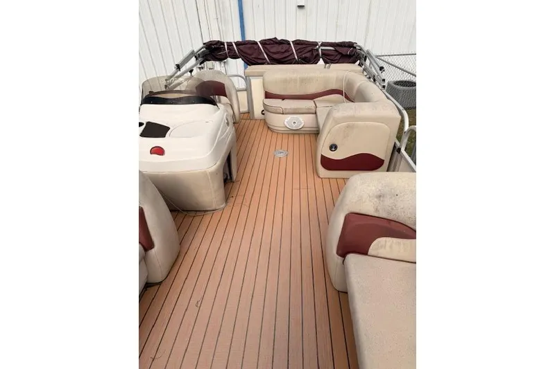 Slide: The Image of 2011 Sun Tracker Party Barge 21 Signature Series interior with seating and helm. - 12