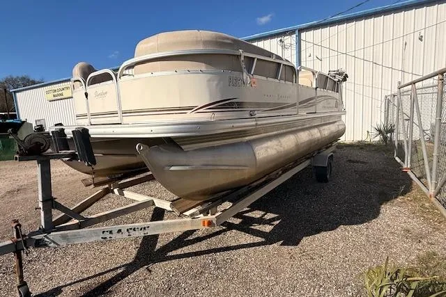 Slide: The Image of 2011 Sun Tracker Party Barge 21 Signature Series pontoon boat on trailer. - 5