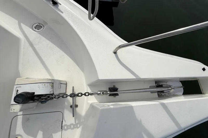 Slide: The Image of Anchor chain mechanism on 1999 Silverton 392 Motor Yacht deck. - 16
