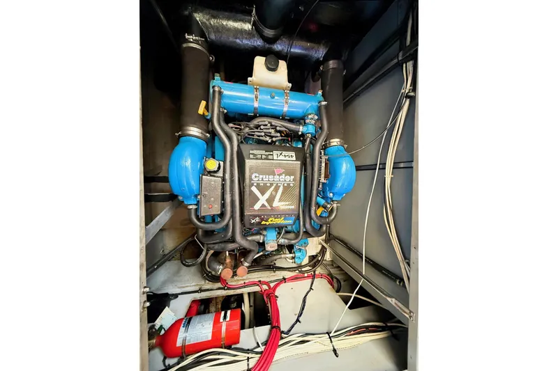 Slide: The Image of Engine compartment of a 1999 Silverton 392 Motor Yacht with Crusader XL engine. - 53
