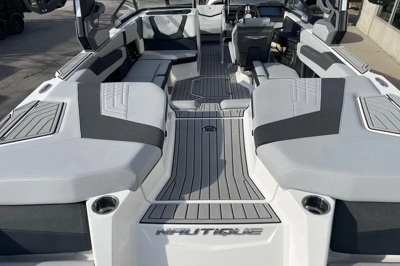 Slide: The Image of 2024 Nautique Super Air Nautique G23 interior with sleek seating and modern design. - 4