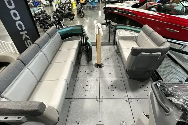 Slide: The Image of Interior of a 2026 Sea-Doo KIT SWT CRUISE boat with gray seating. - 28