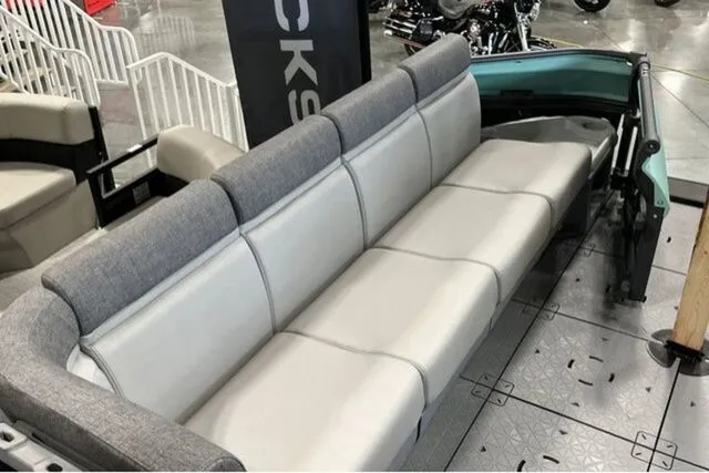 Slide: The Image of 2026 Sea-Doo KIT SWT CRUISE 21 300 GN interior with gray seating. - 48