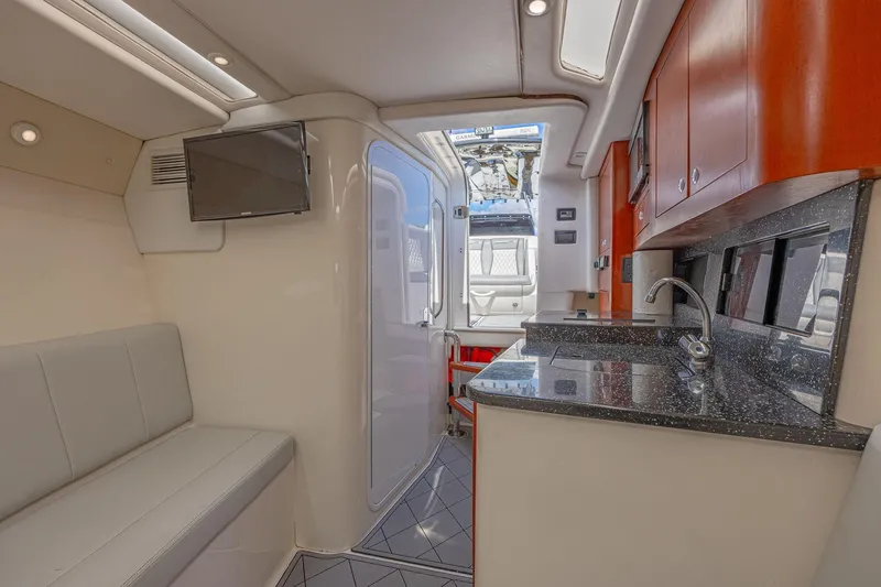 Slide: The Image of Interior of 2010 Concept 4400 Sport Yacht with modern kitchen and seating area. - 25