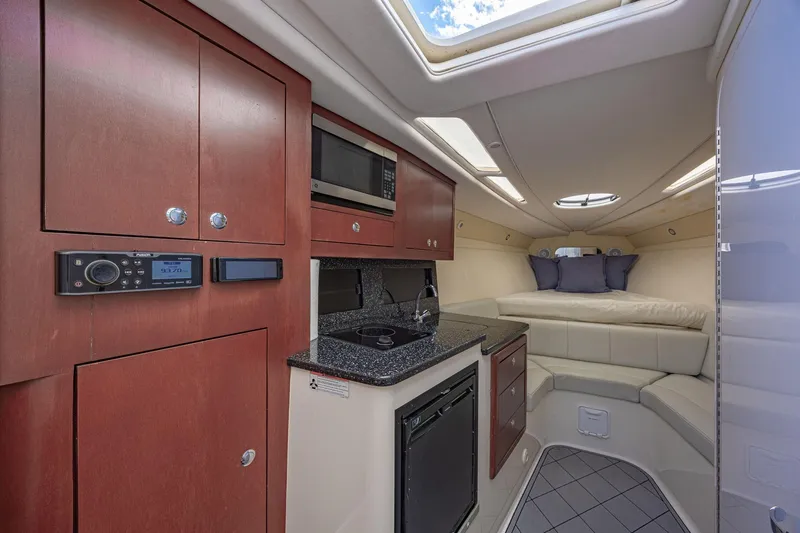 Slide: The Image of Luxurious interior of 2010 Concept 4400 Sport Yacht with kitchenette and cozy seating area. - 29