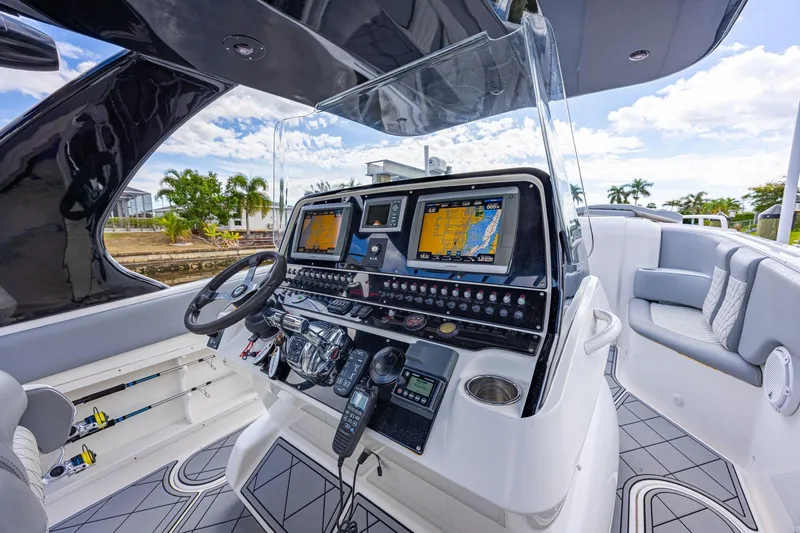 Slide: The Image of Helm of 2010 Concept 4400 Sport Yacht with navigation screens and controls. - 30