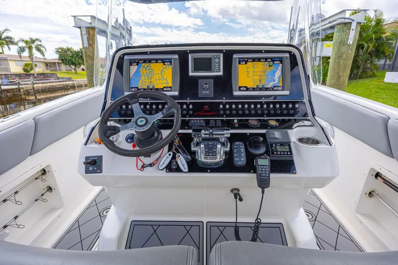Slide: The Image of Helm of 2010 Concept 4400 Sport Yacht with navigation screens and controls. - 32