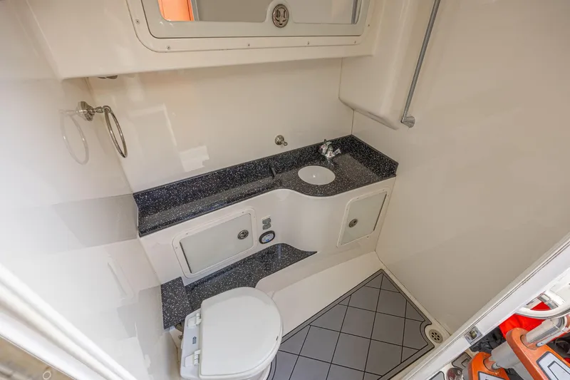Slide: The Image of 2010 Concept 4400 Sport Yacht bathroom with modern fixtures and compact design. - 34