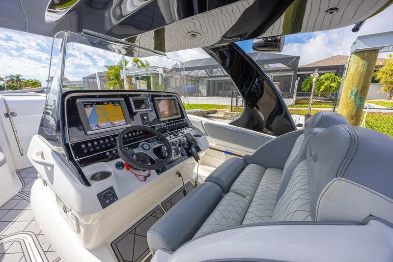 Slide: The Image of 2010 Concept 4400 Sport Yacht cockpit with advanced navigation system and luxurious seating. - 48