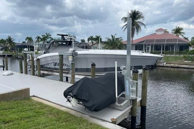 Slide: The Image of 2010 Concept 4400 Sport Yacht cruising on calm blue waters. - 6