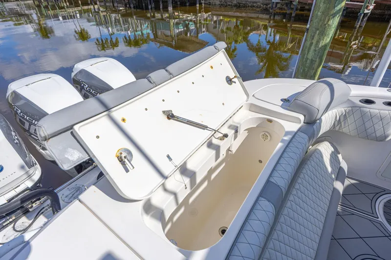 Slide: The Image of 2010 Concept 4400 Sport Yacht with open storage compartment and powerful outboard engines. - 62