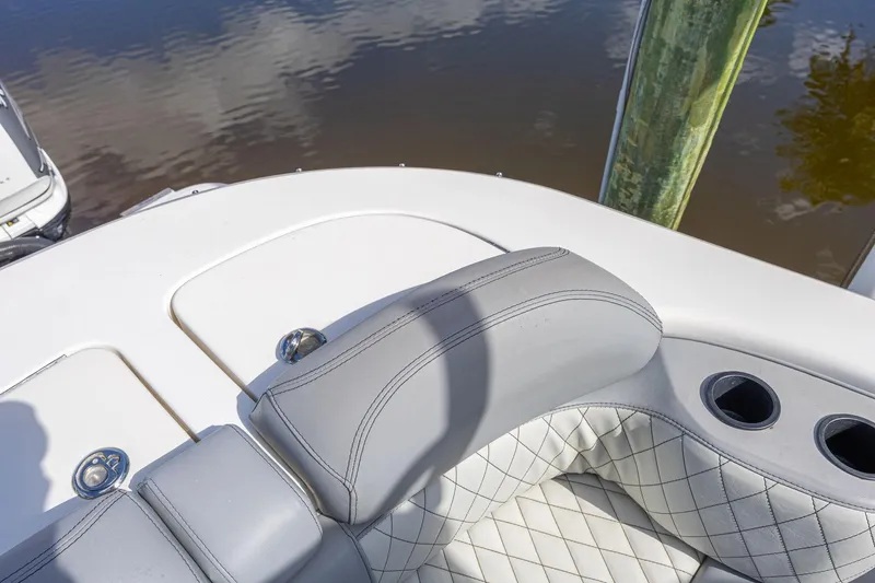 Slide: The Image of Luxury seating on 2010 Concept 4400 Sport Yacht, featuring quilted upholstery and cup holders. - 64