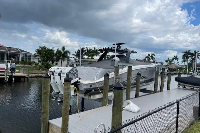 Slide: The Image of 2010 Concept 4400 Sport Yacht cruising on calm blue waters. - 7