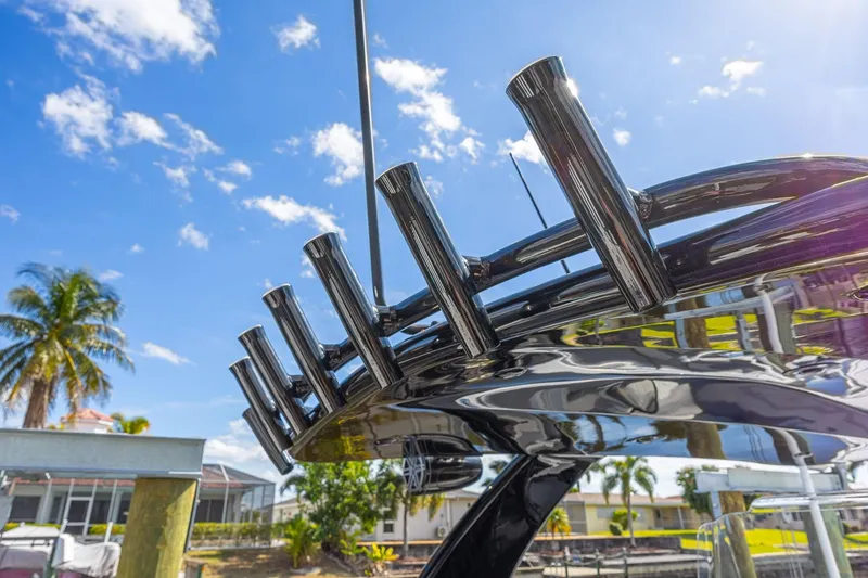 Slide: The Image of Chrome details on 2010 Concept 4400 Sport Yacht against a sunny sky backdrop. - 72