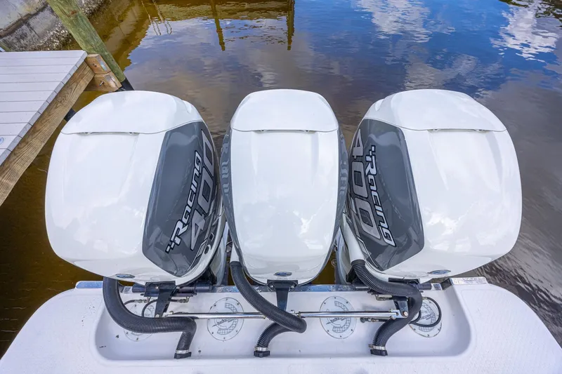 Slide: The Image of Triple Racing 400 outboard engines on a 2010 Concept 4400 Sport Yacht. - 75
