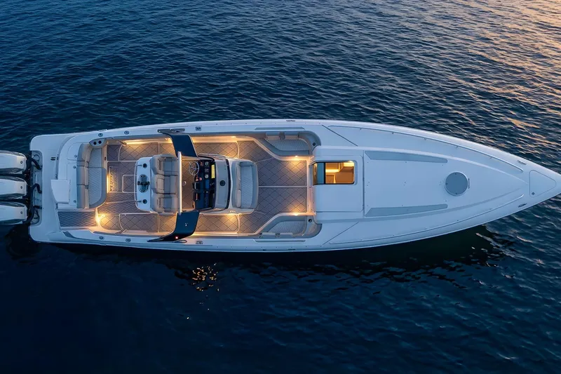 Slide: The Image of Overhead view of 2010 Concept 4400 Sport Yacht illuminated on water. - 77