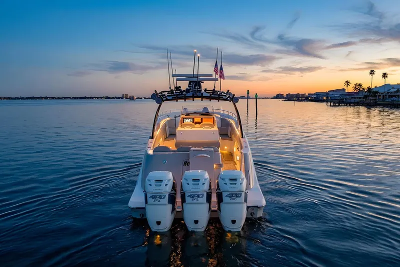 Slide: The Image of 2010 Concept 4400 Sport Yacht at sunset on calm waters. - 79