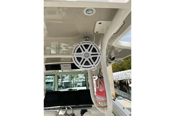 Slide: The Image of 2018 Hydra-Sports 3000 CC boat interior with speaker and navigation equipment. - 16