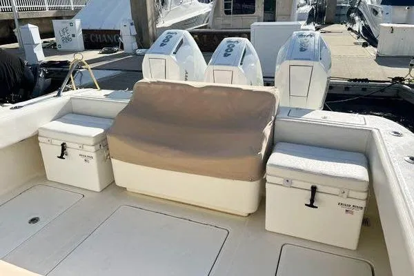 Slide: The Image of 2018 Hydra-Sports 3000 CC boat deck with seating and storage coolers. - 9