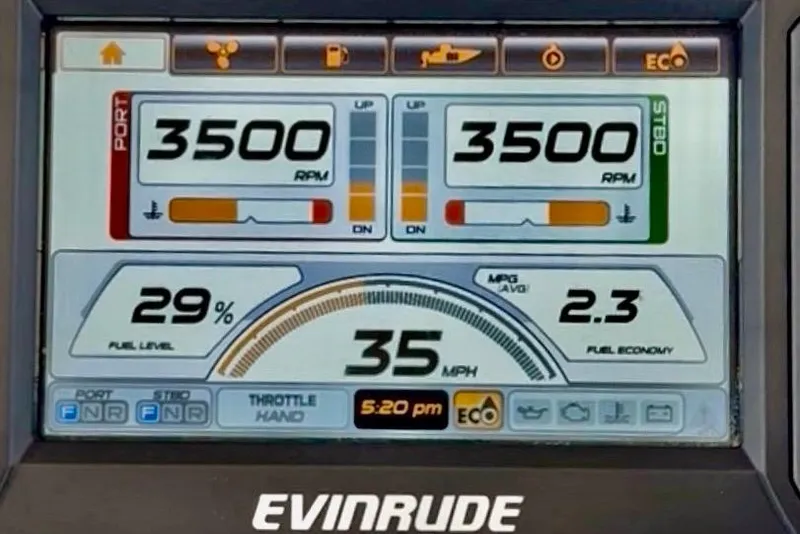 Slide: The Image of Evinrude boat display showing RPM, speed, fuel level, and economy for Intrepid 289 Center Console. - 40