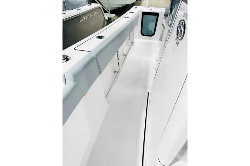 Slide: The Image of 2026 Sportsman Open 232 Center Console boat interior, showcasing sleek design and spacious layout. - 13