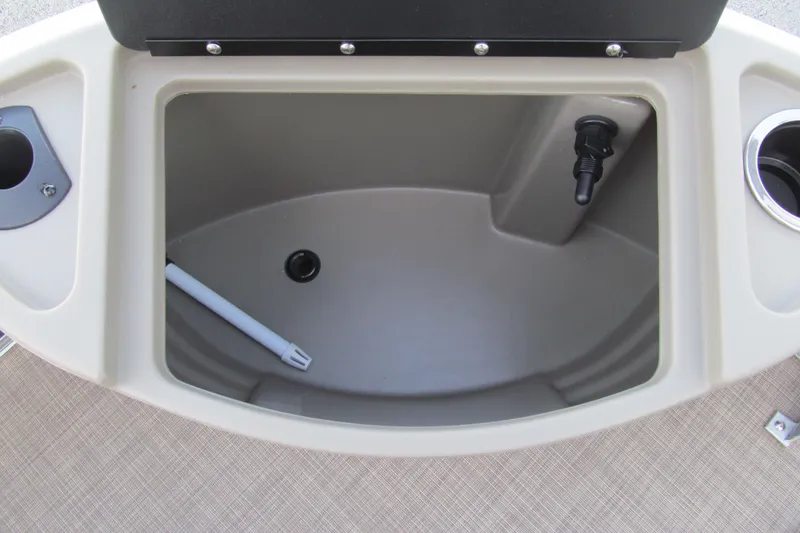 Slide: The Image of 2024 Sun Tracker Bass Buggy 18 DLX livewell with cup holder and drain plug. - 8