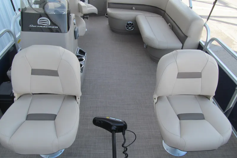 Slide: The Image of 2024 Sun Tracker Bass Buggy 18 DLX interior with comfortable seating and modern design. - 9