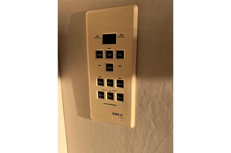 Slide: The Image of Thermostat control panel on 1997 Sea Ray 370 Aft Cabin yacht. - 72