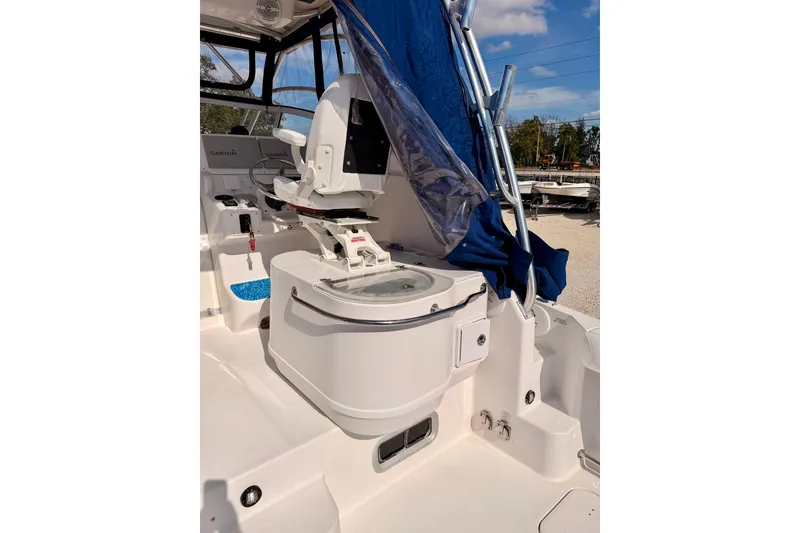 Slide: The Image of 2007 Pro-Line 32 Express boat interior with captain's chair and navigation equipment. - 20