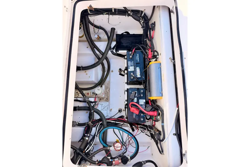 Slide: The Image of Electrical system of a 2007 Pro-Line 32 Express boat, featuring batteries and wiring. - 40
