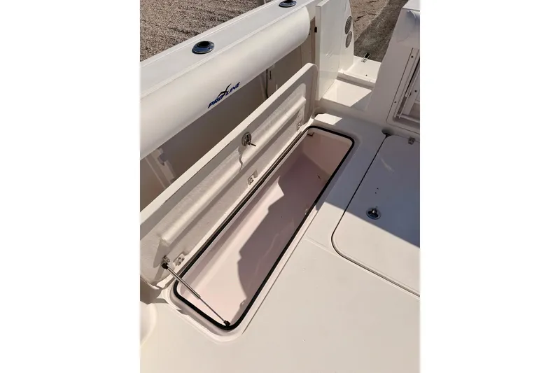 Slide: The Image of Open storage compartment on 2007 Pro-Line 32 Express boat deck. - 41